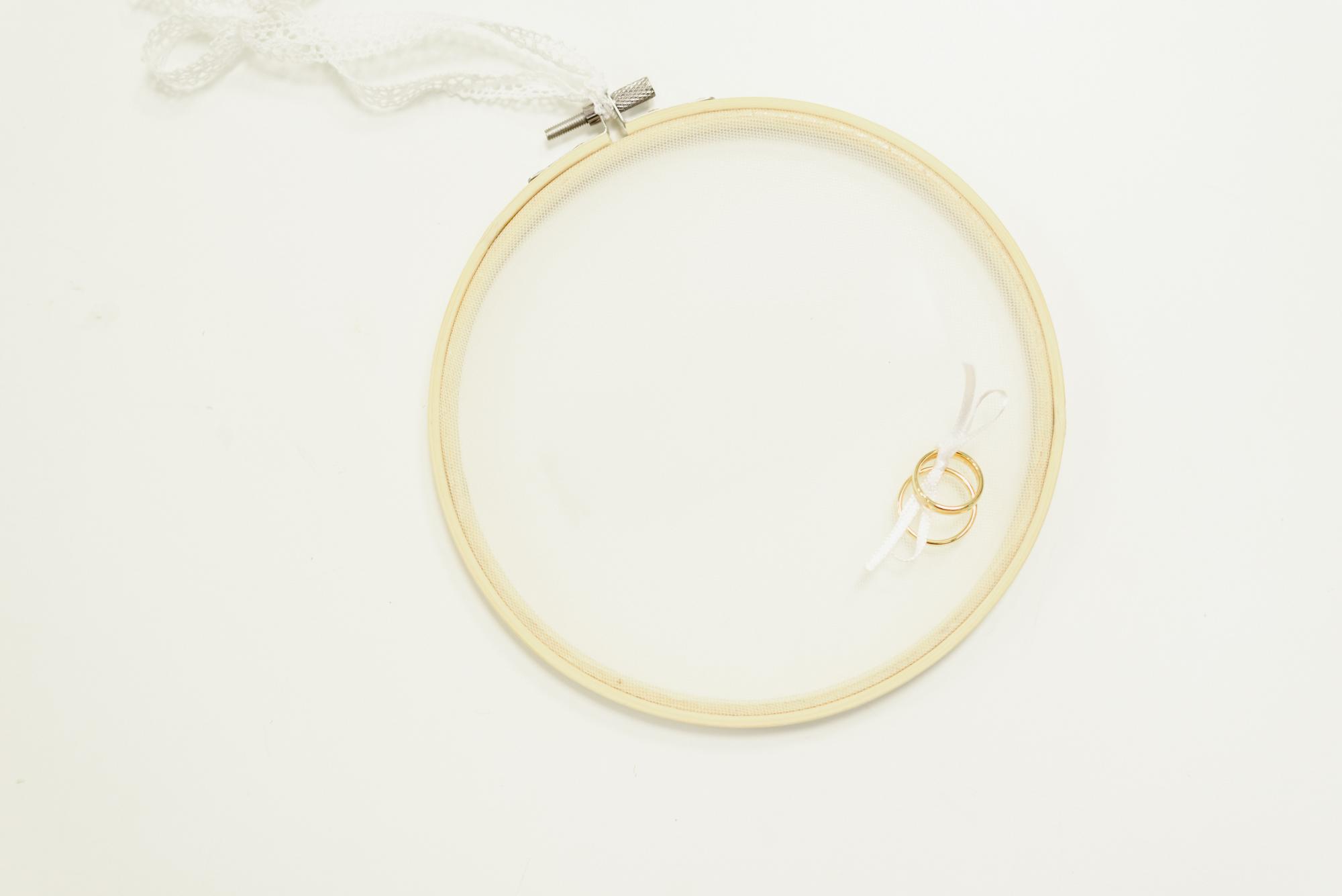 close-up elegant embroidery hoop with gold threads